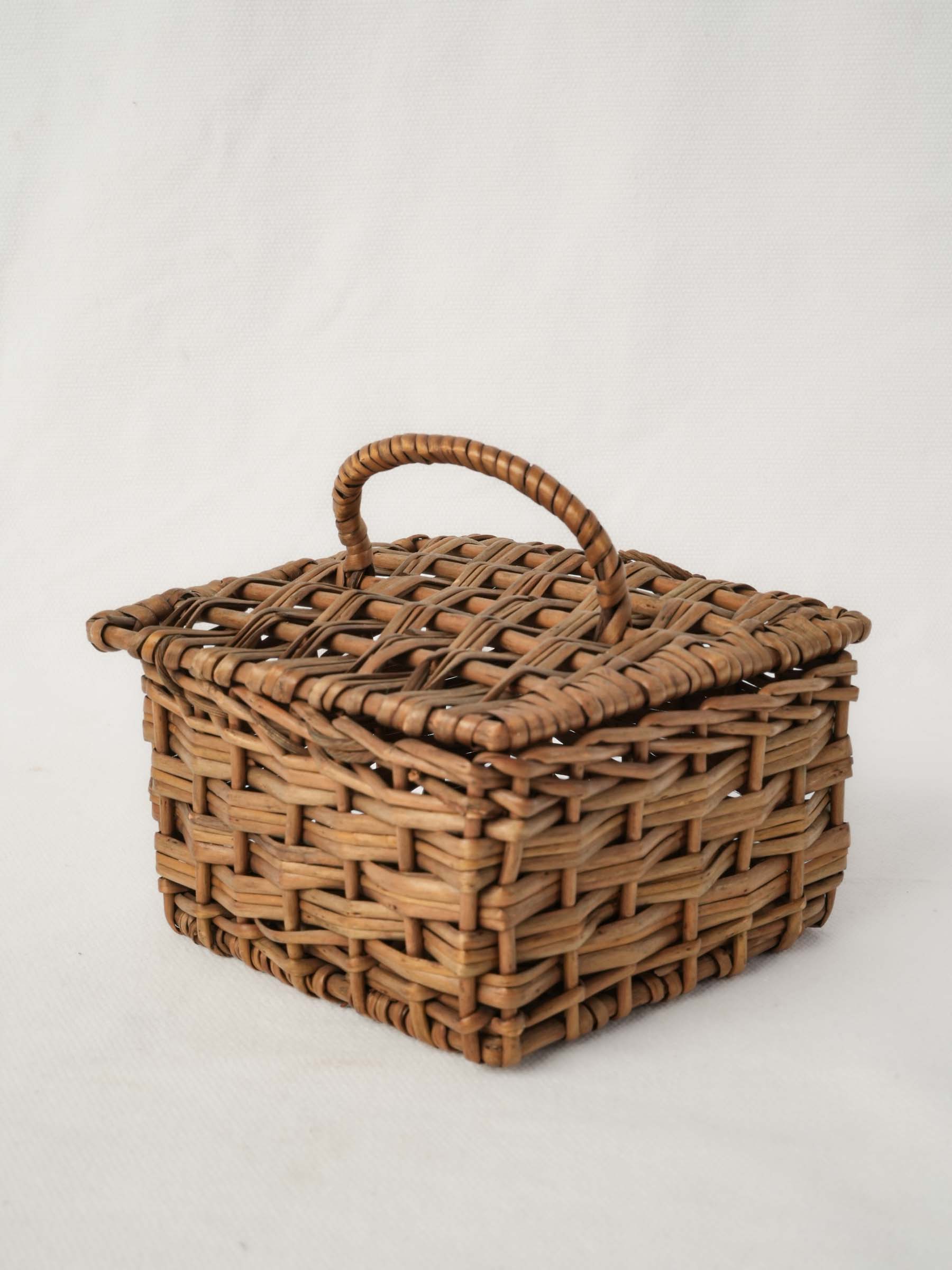 Small vintage wicker trinket box