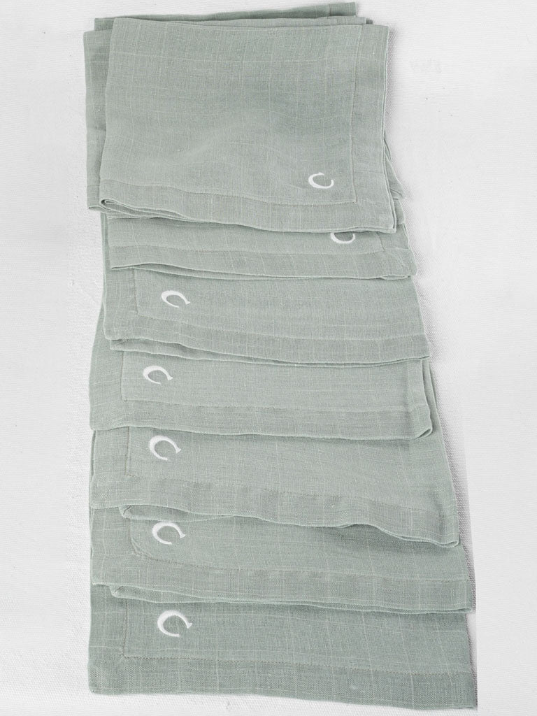 Monogrammed sage green linen napkins