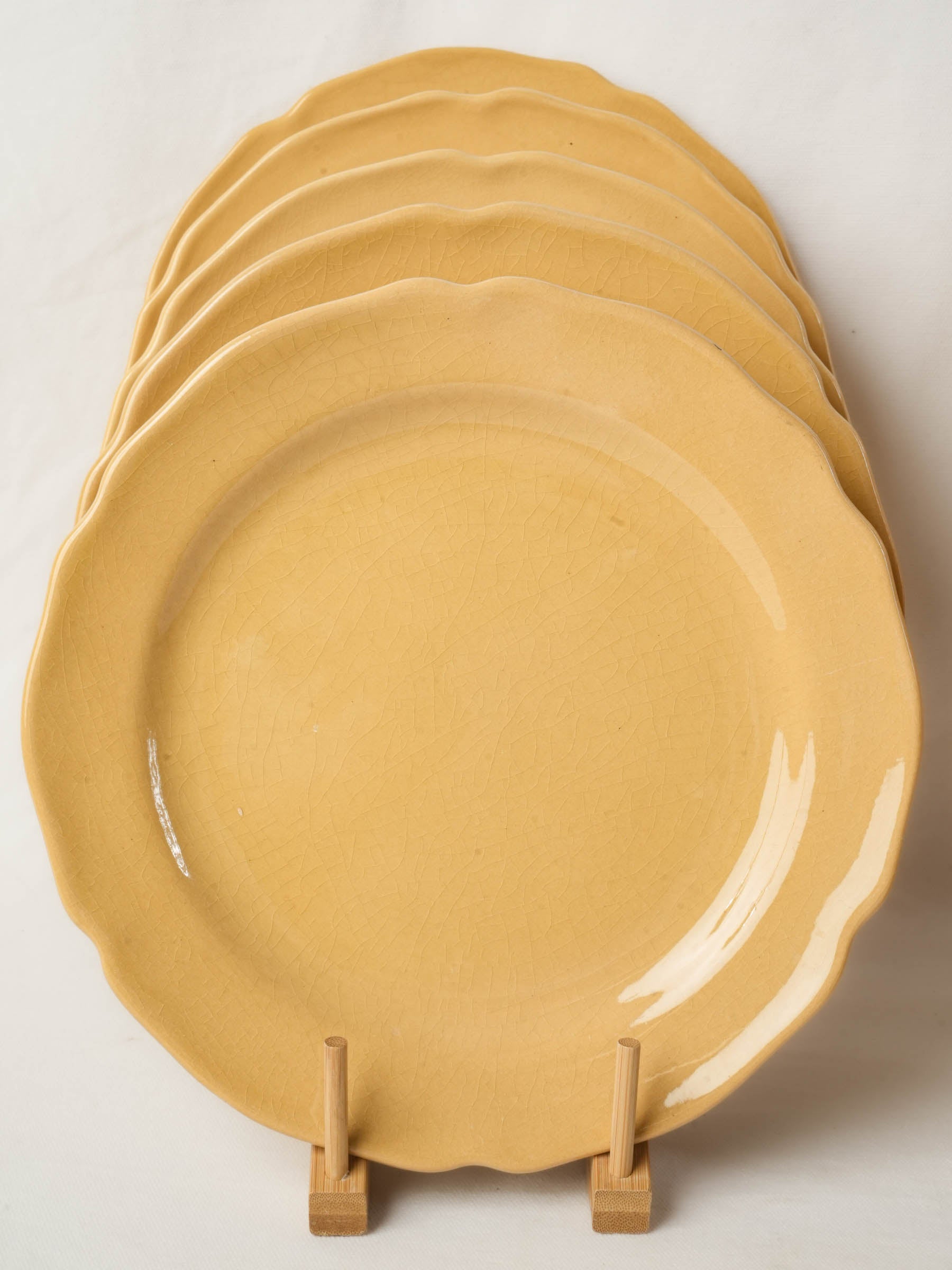 Set of ten ocher dinner plates