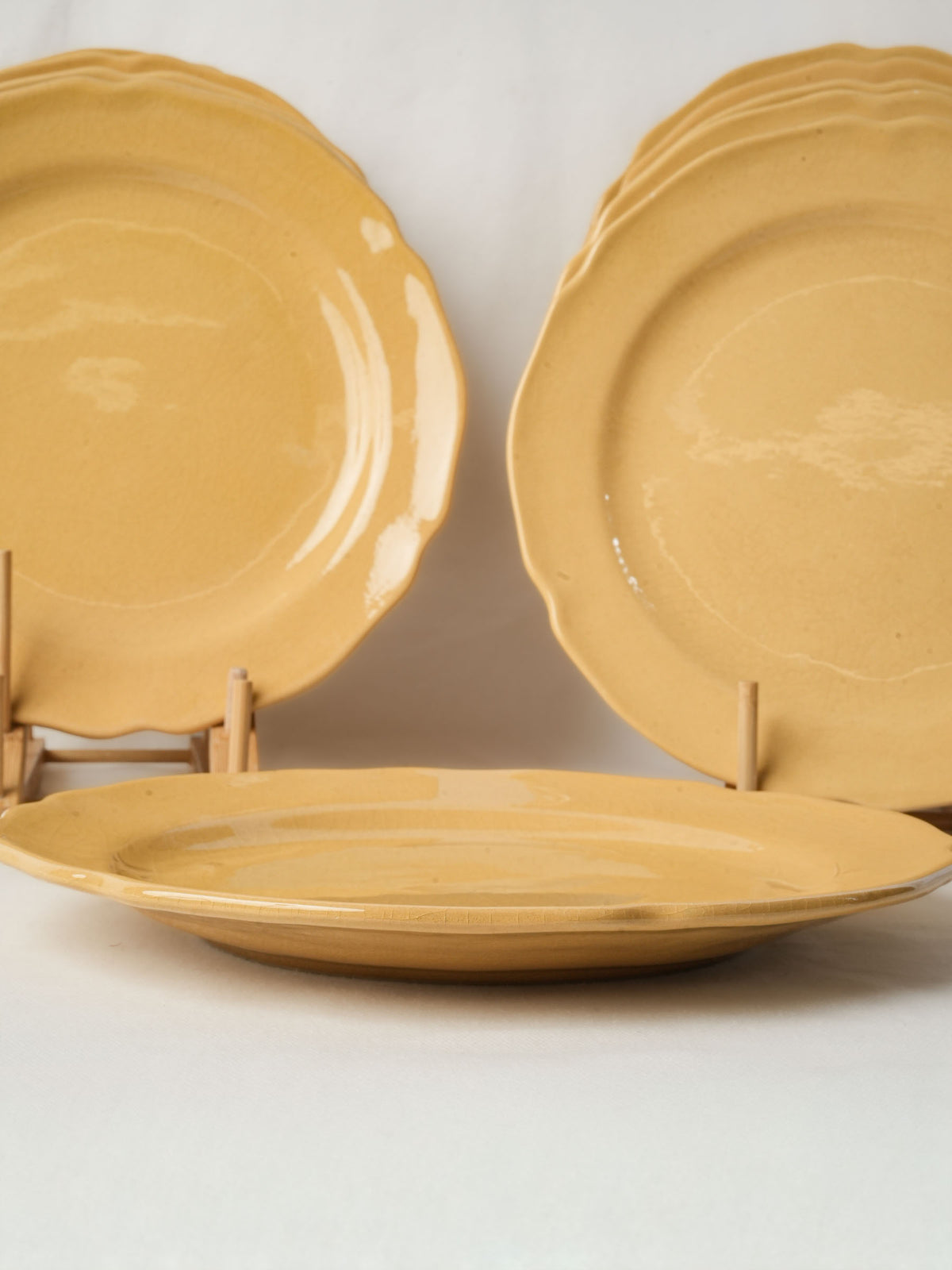 Set of ten ocher dinner plates