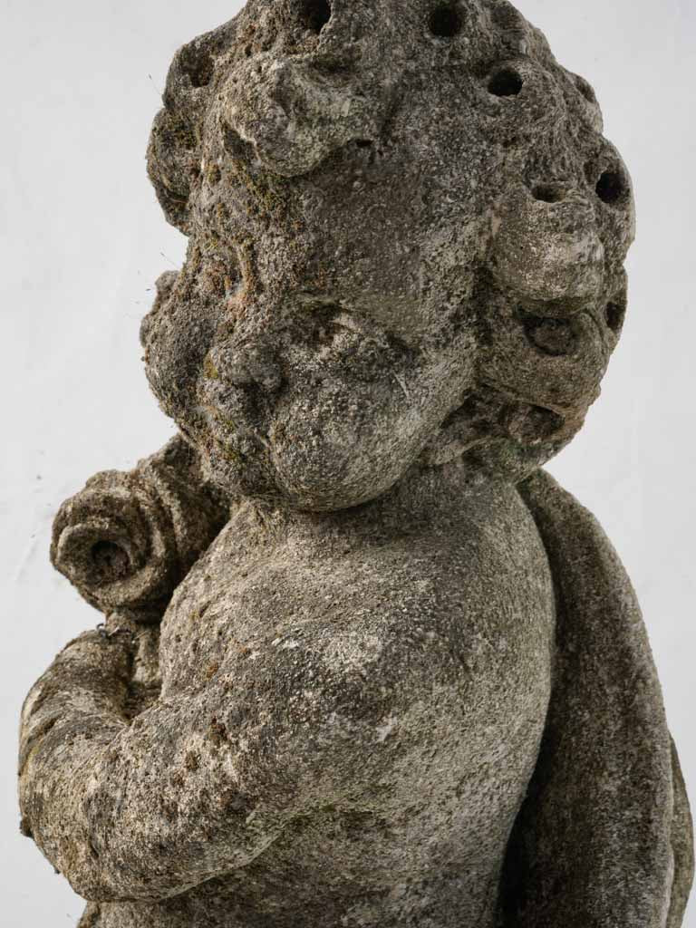 Classic ornate French garden statue