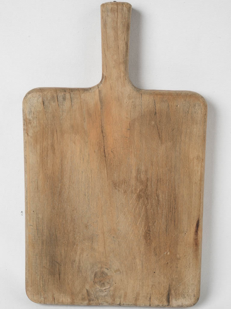 Handcrafted aged wooden herb cutter