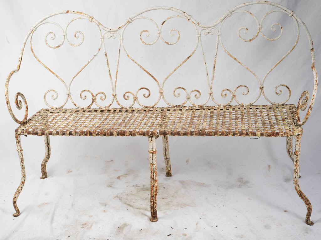 Ornate antique wrought iron bench