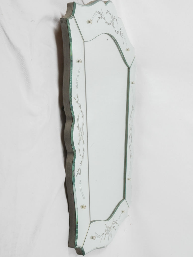 Traditional Venetian mirror with flower motifs