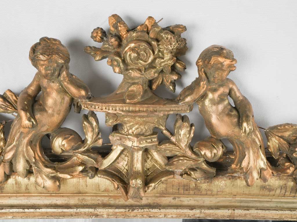 Aged cherub-framed Louis Philippe mirror