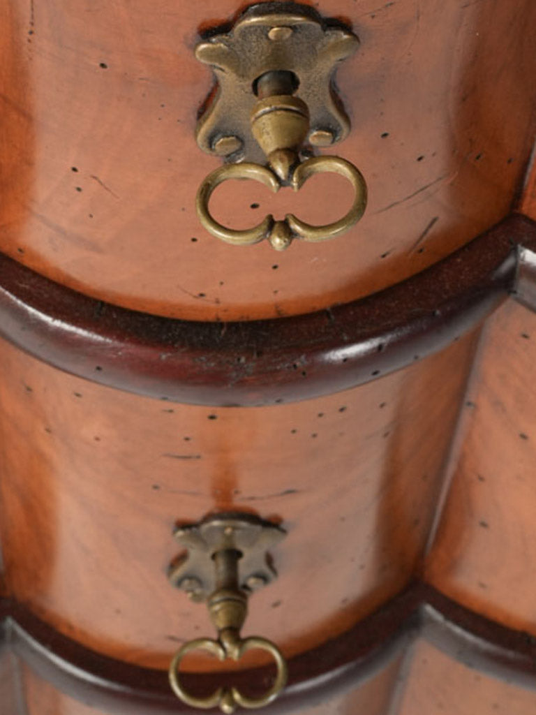 Stylish Serpentine Front Cherrywood Chest