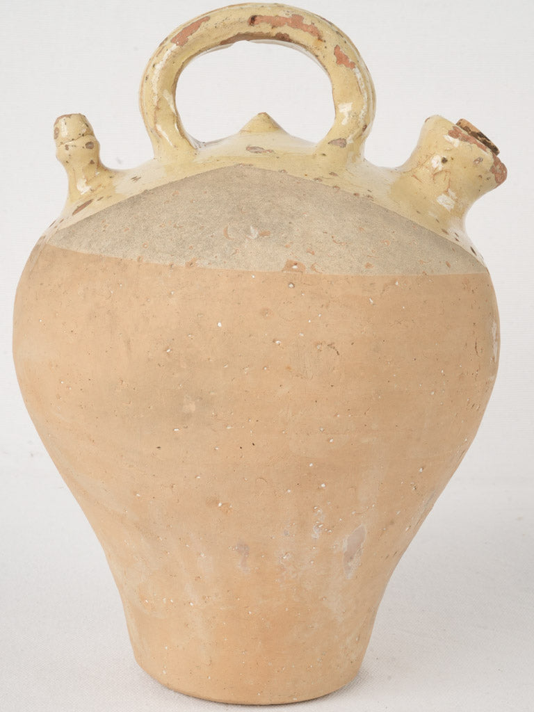 Distinctive closed-top Kanti jug