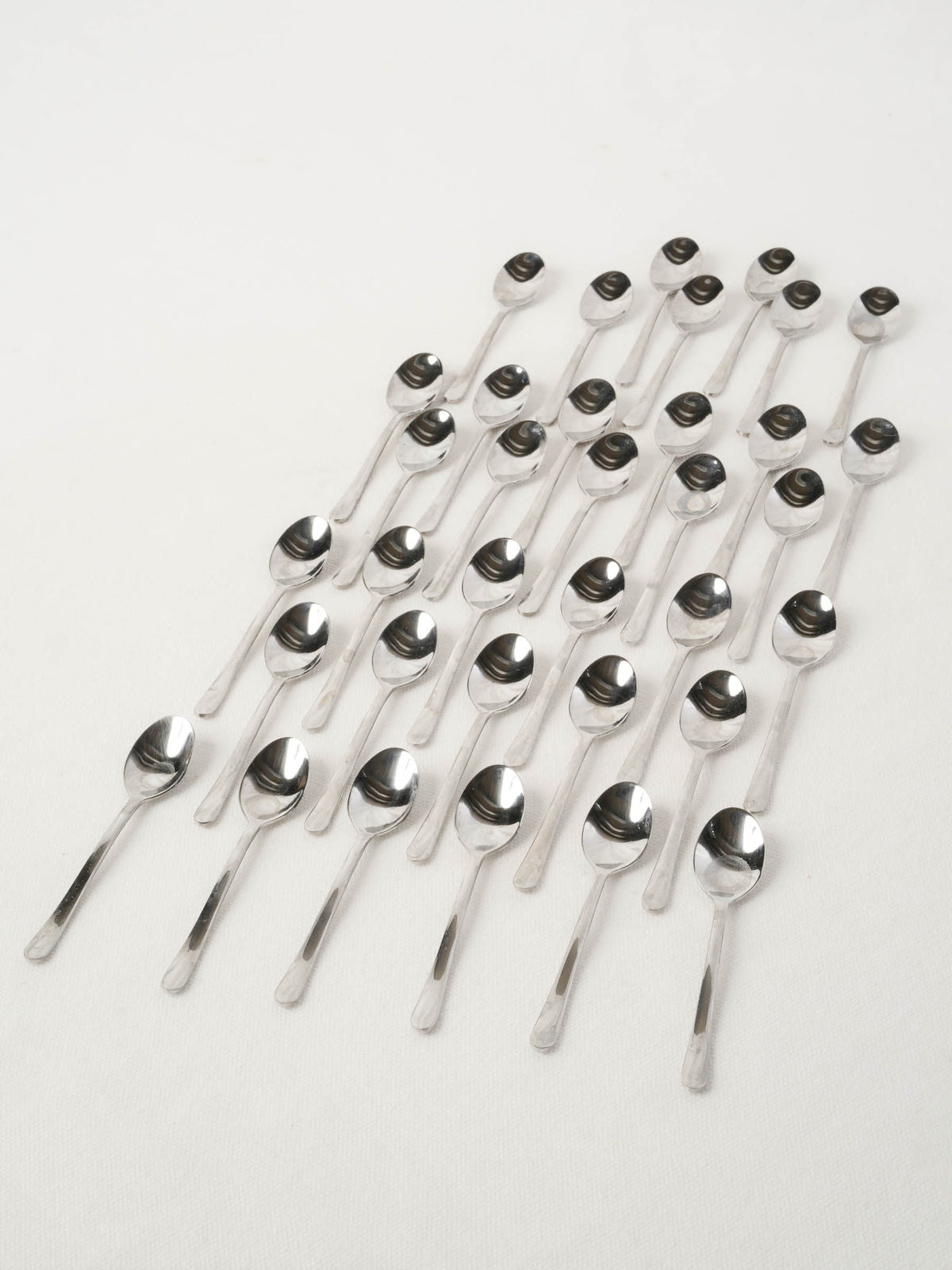 Collection of stainless steel tasting spoons