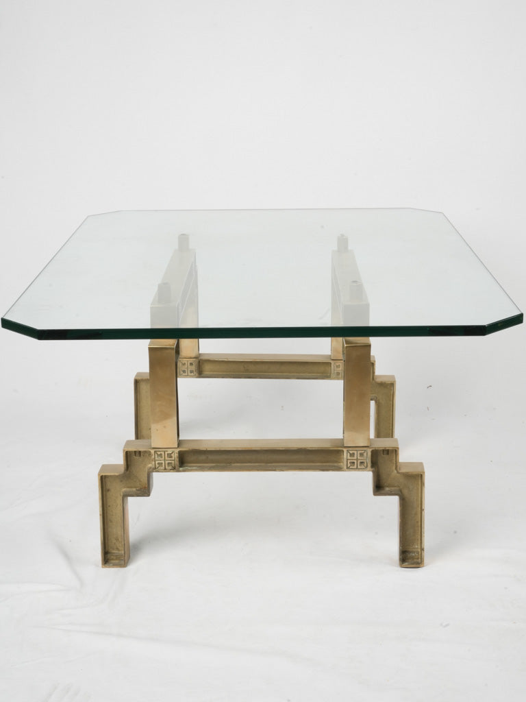 Floating design bronze-leg table
