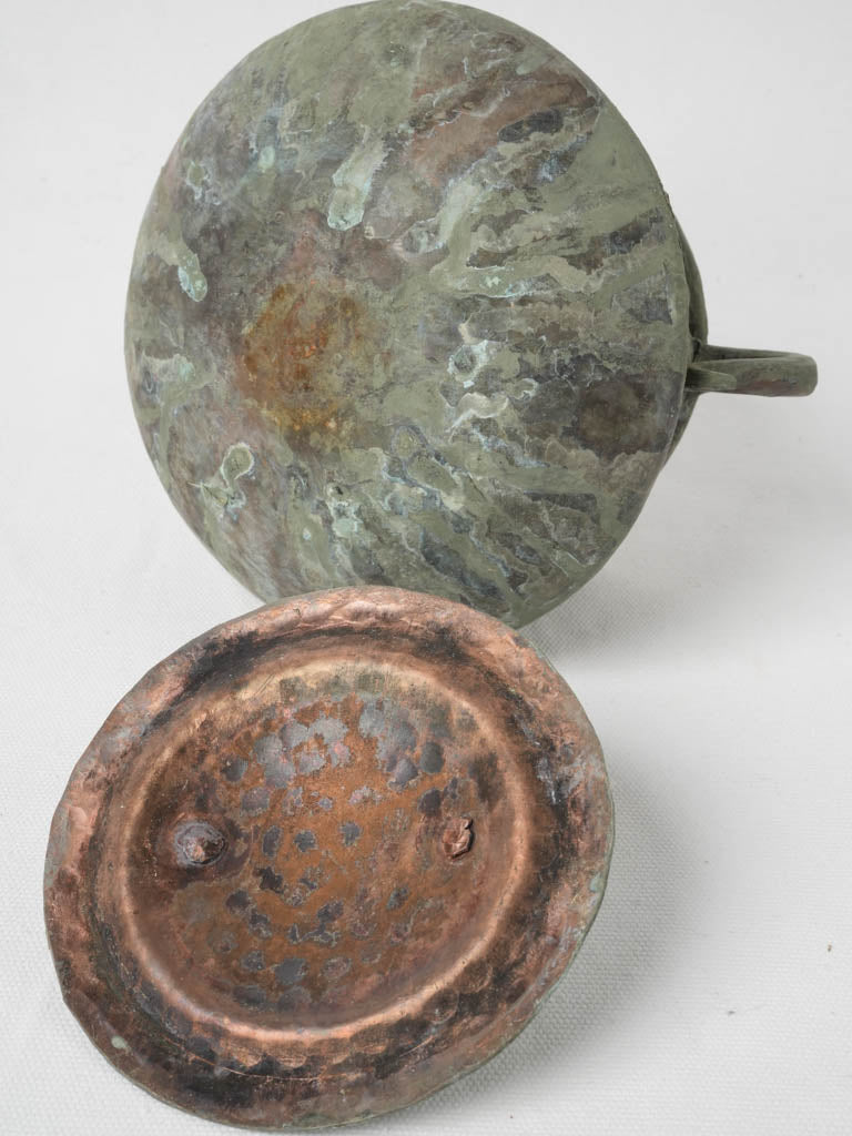 Scrolled-handled copper cauldron