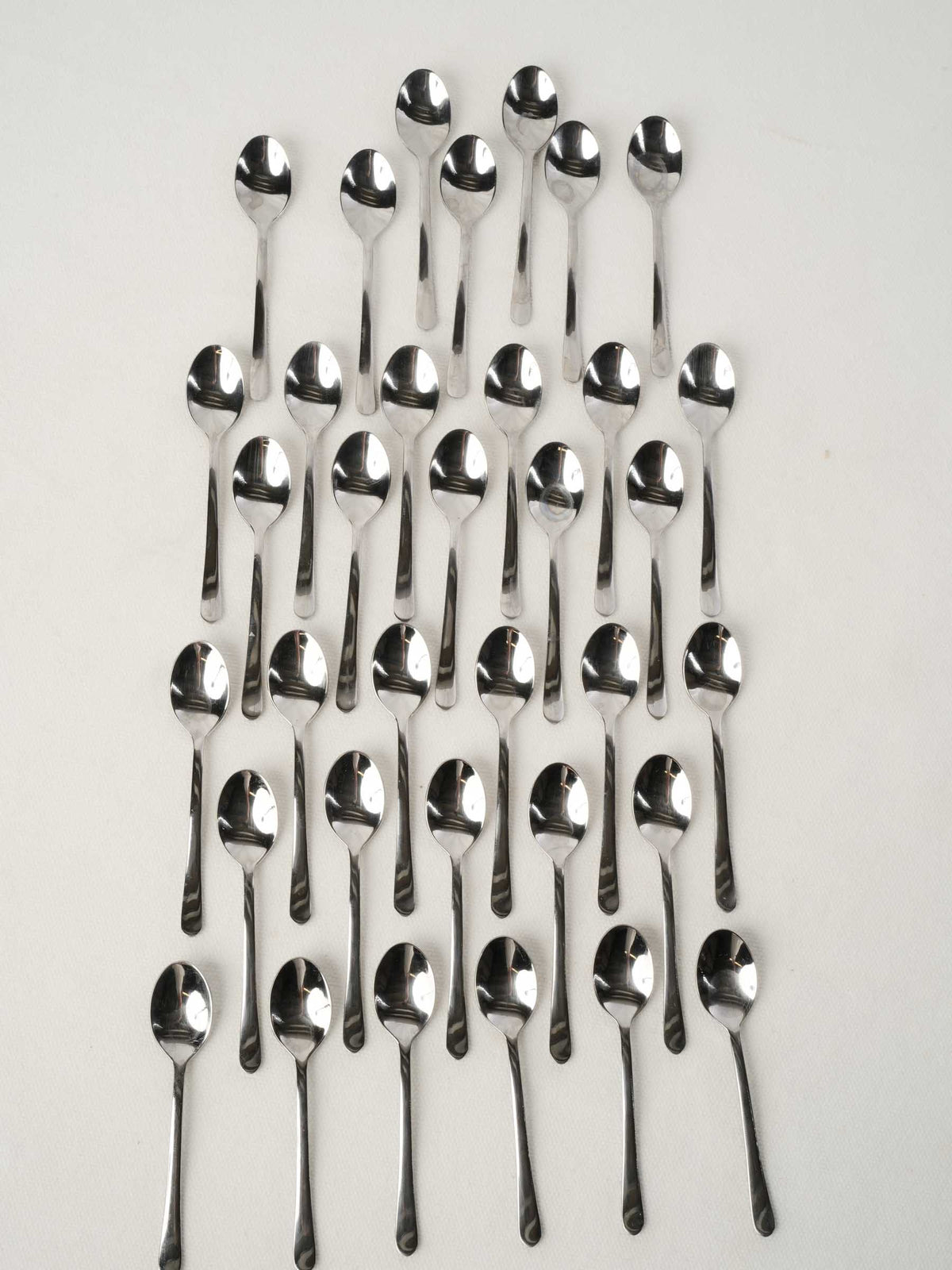 Collection of stainless steel tasting spoons