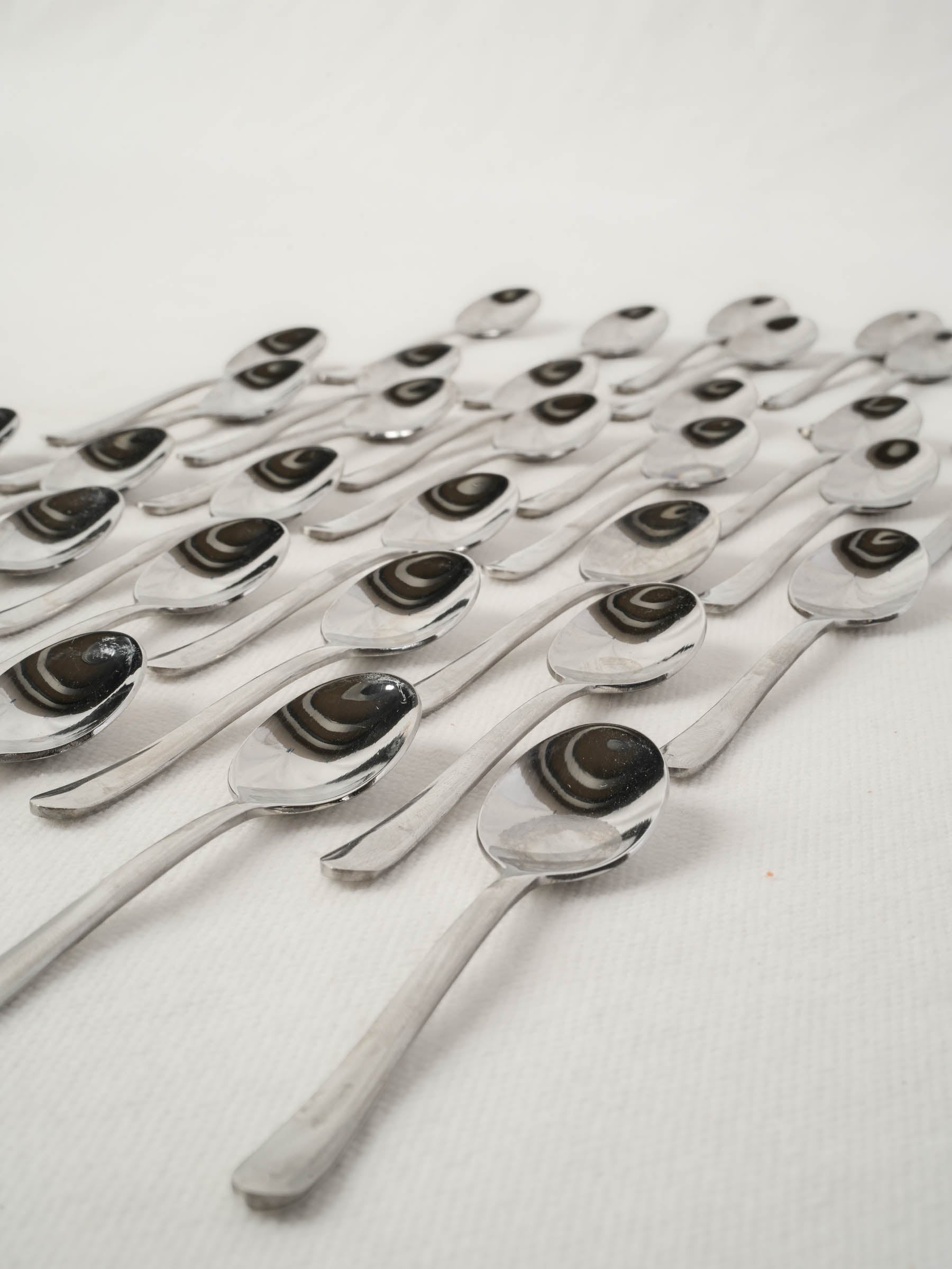 Collection of stainless steel tasting spoons