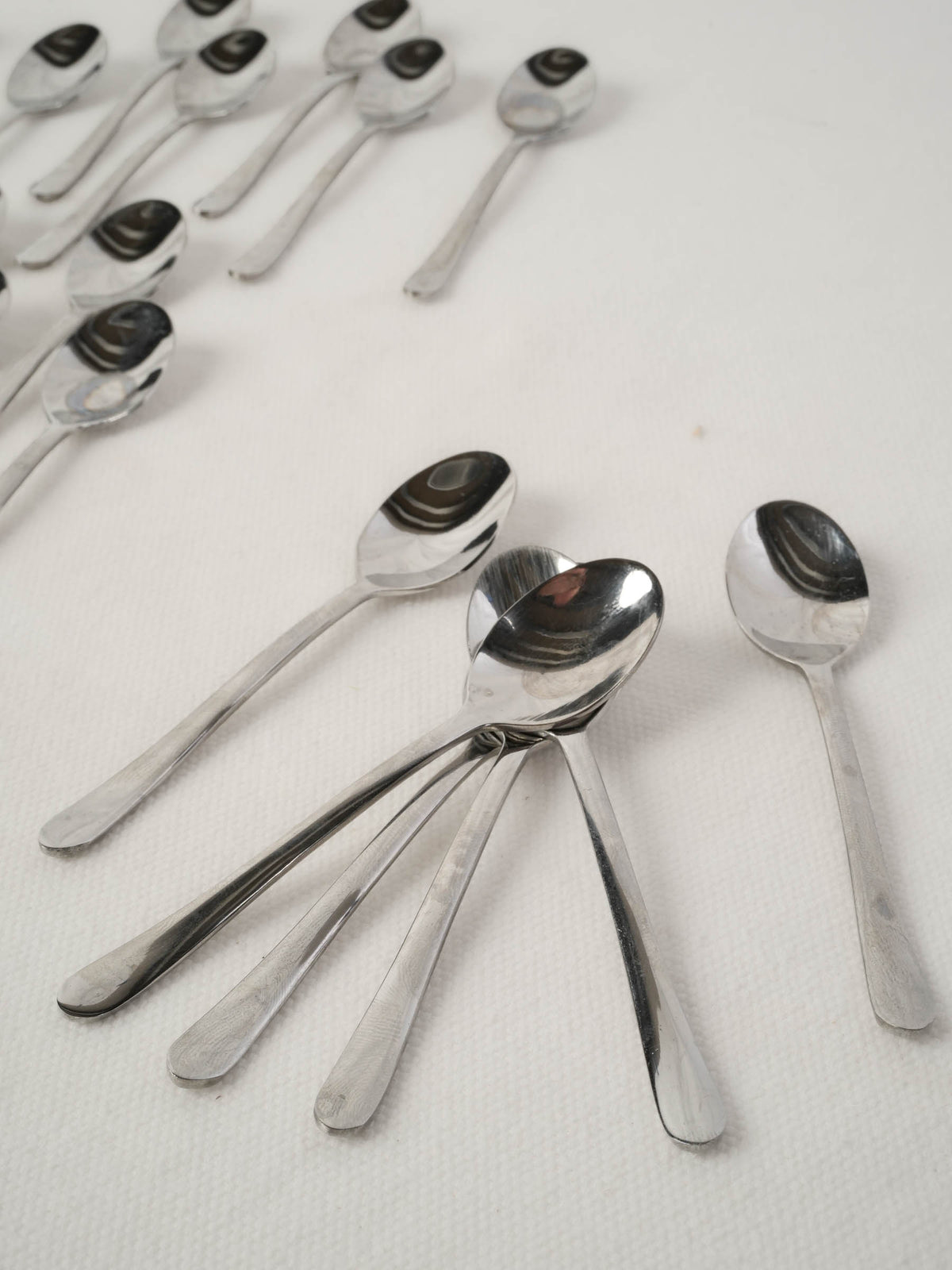 Collection of stainless steel tasting spoons