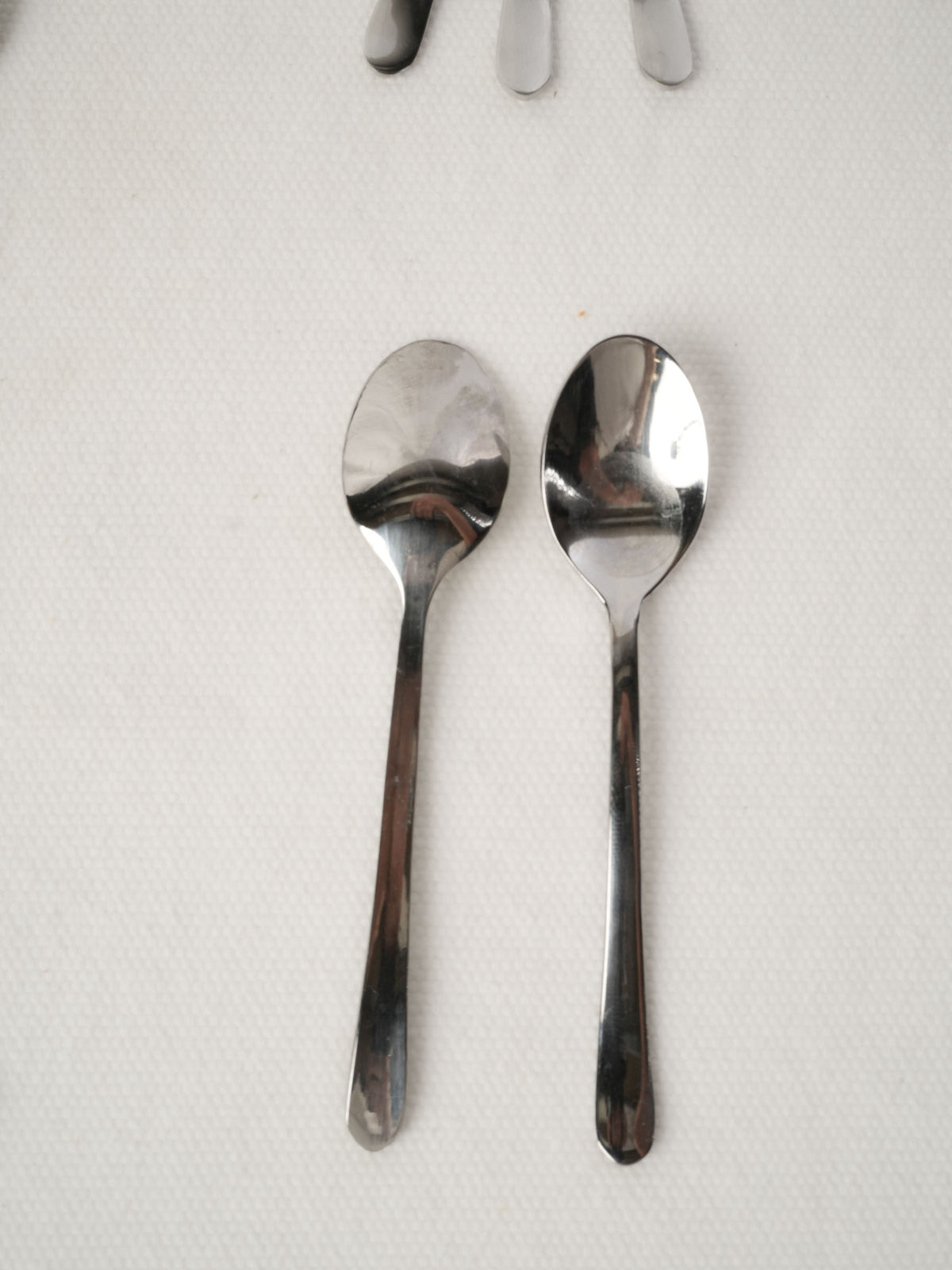 Collection of stainless steel tasting spoons