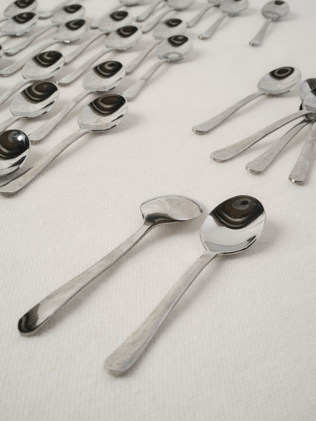 Collection of stainless steel tasting spoons