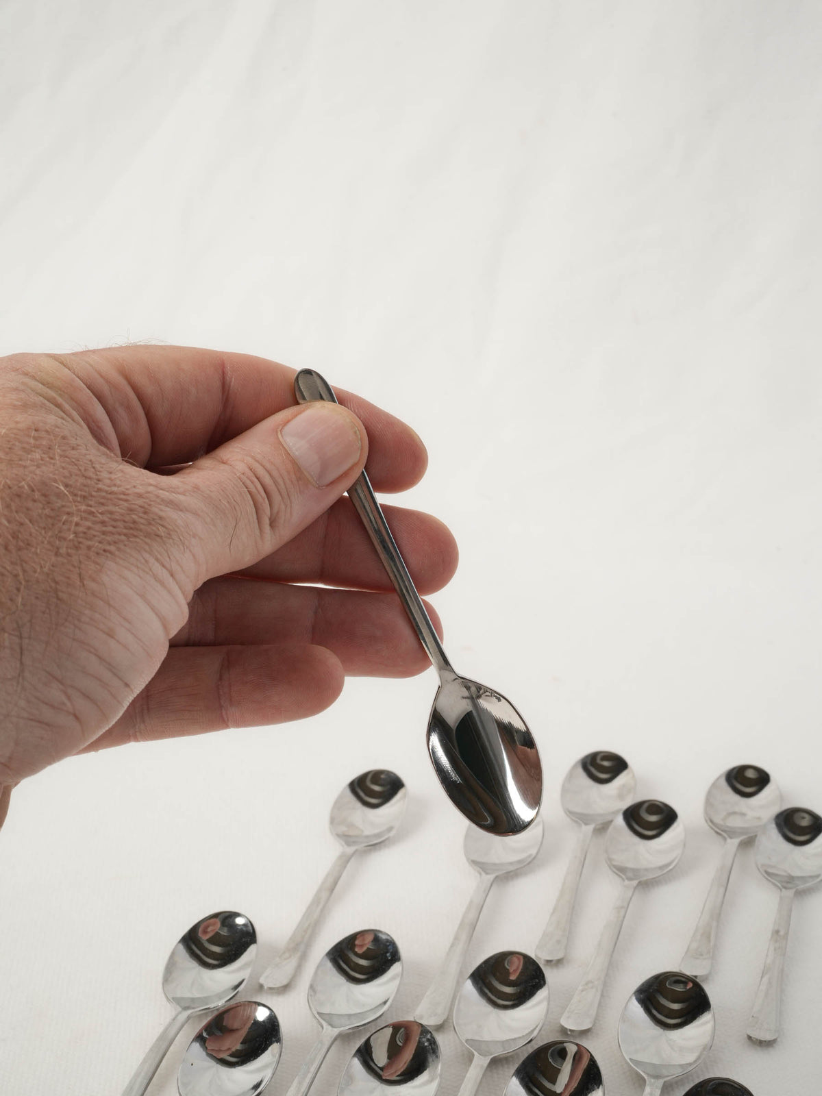 Collection of stainless steel tasting spoons
