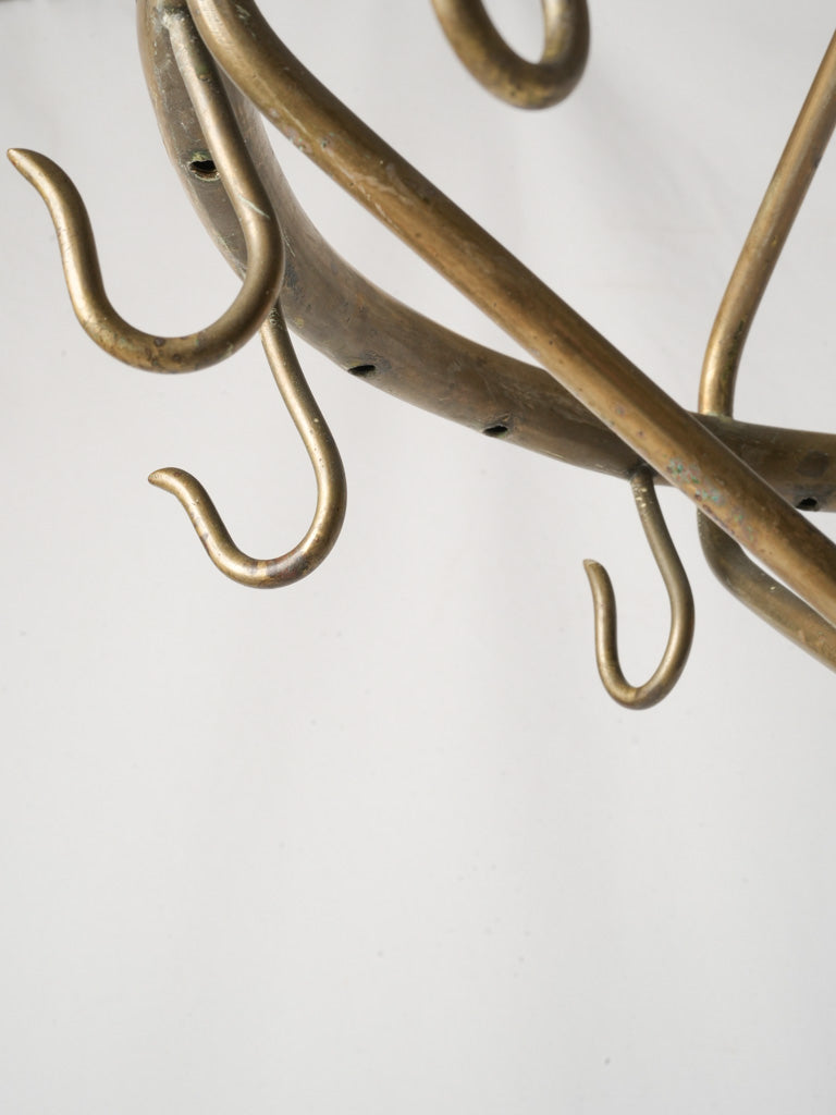 Graceful arcs brass sculpture