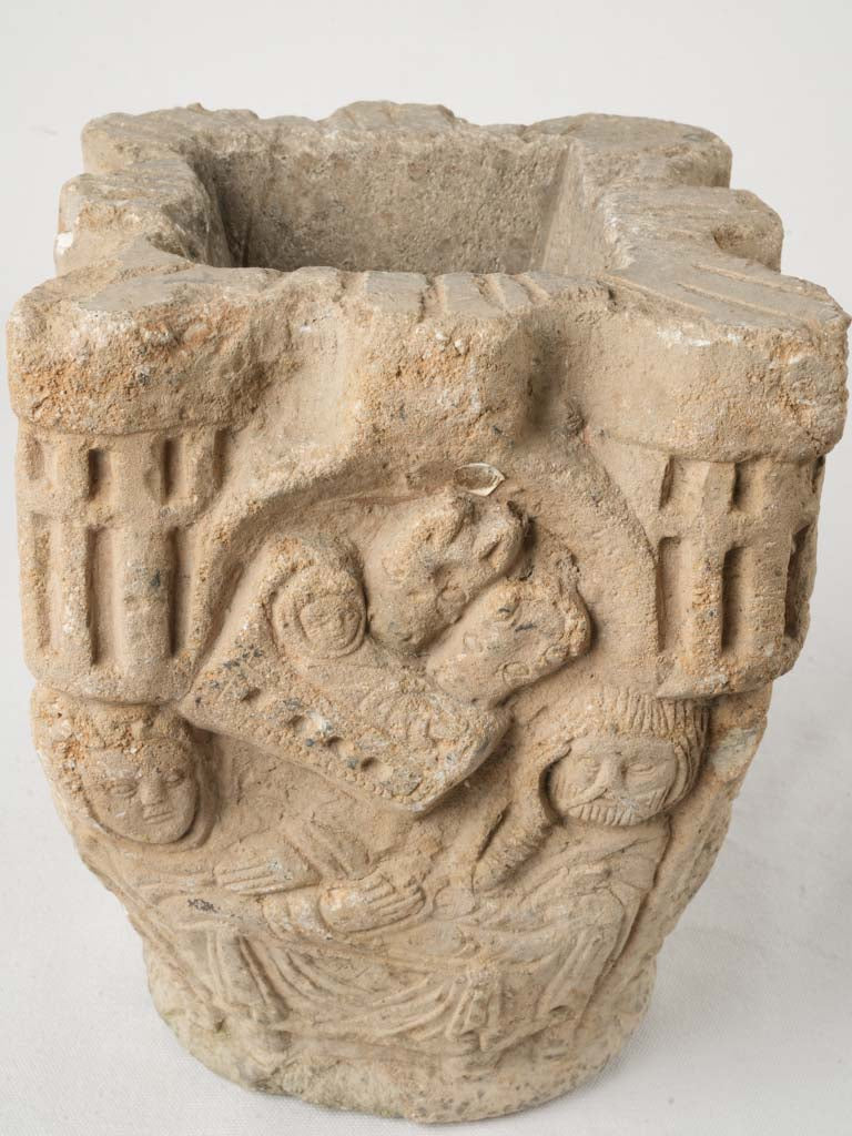 Timeworn sacred motif column capital