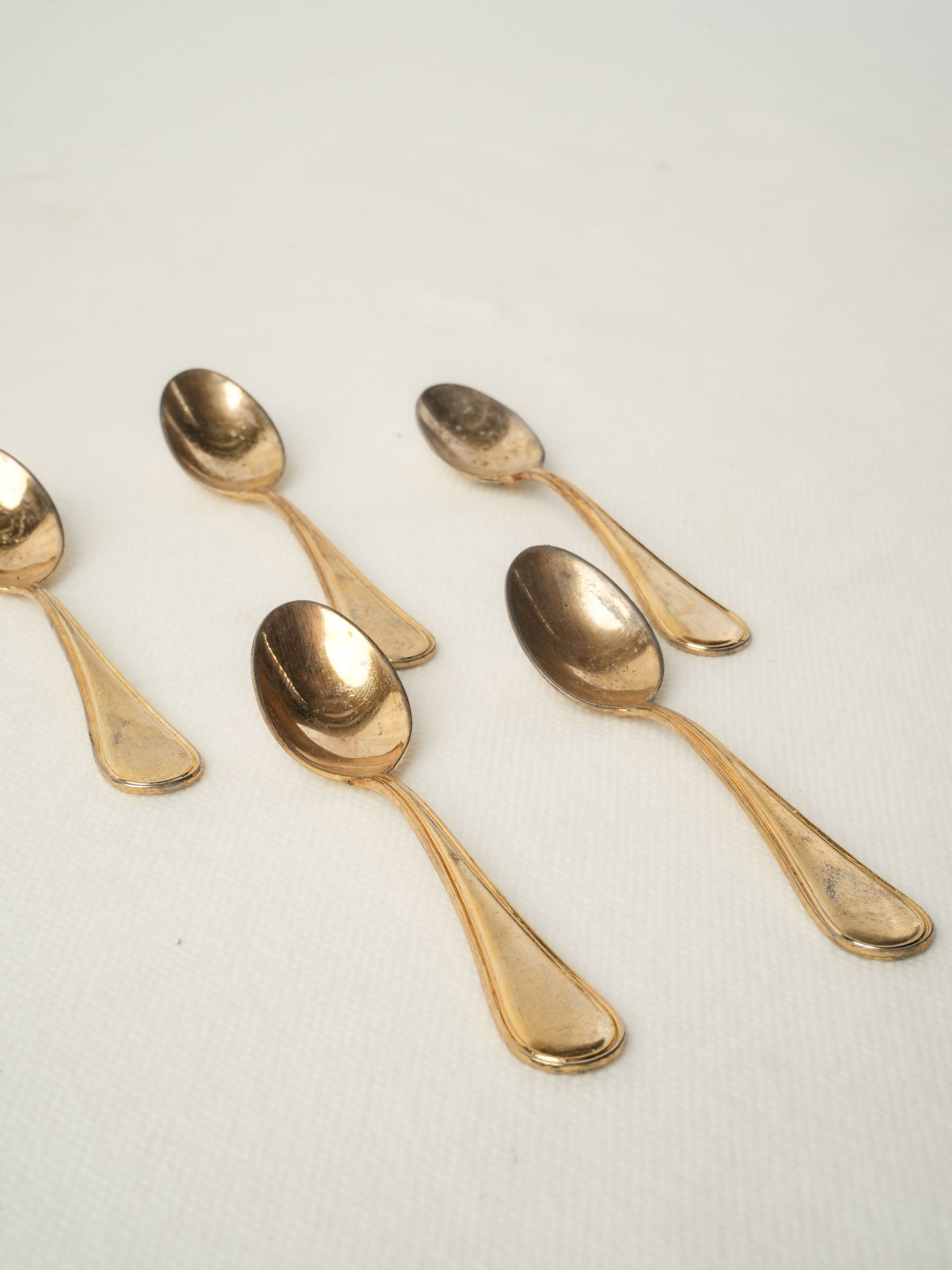 Set of five caviar spoons with gold patina