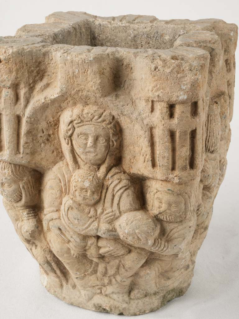 Weathered limestone church column capital