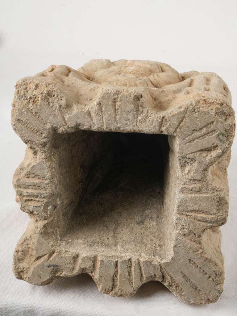 Detailed carved ecclesiastical column capital