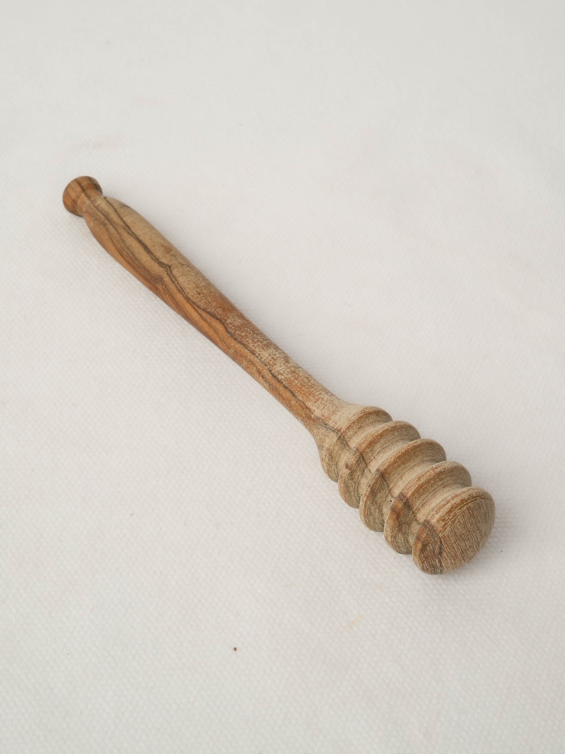 Vintage wooden honey dipper