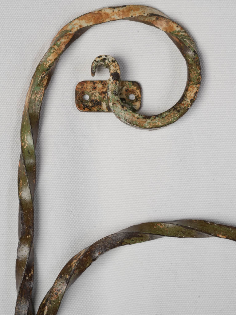 Sculptural decorative wrought iron holder