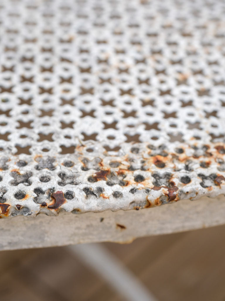 Graceful curved-leg perforated table