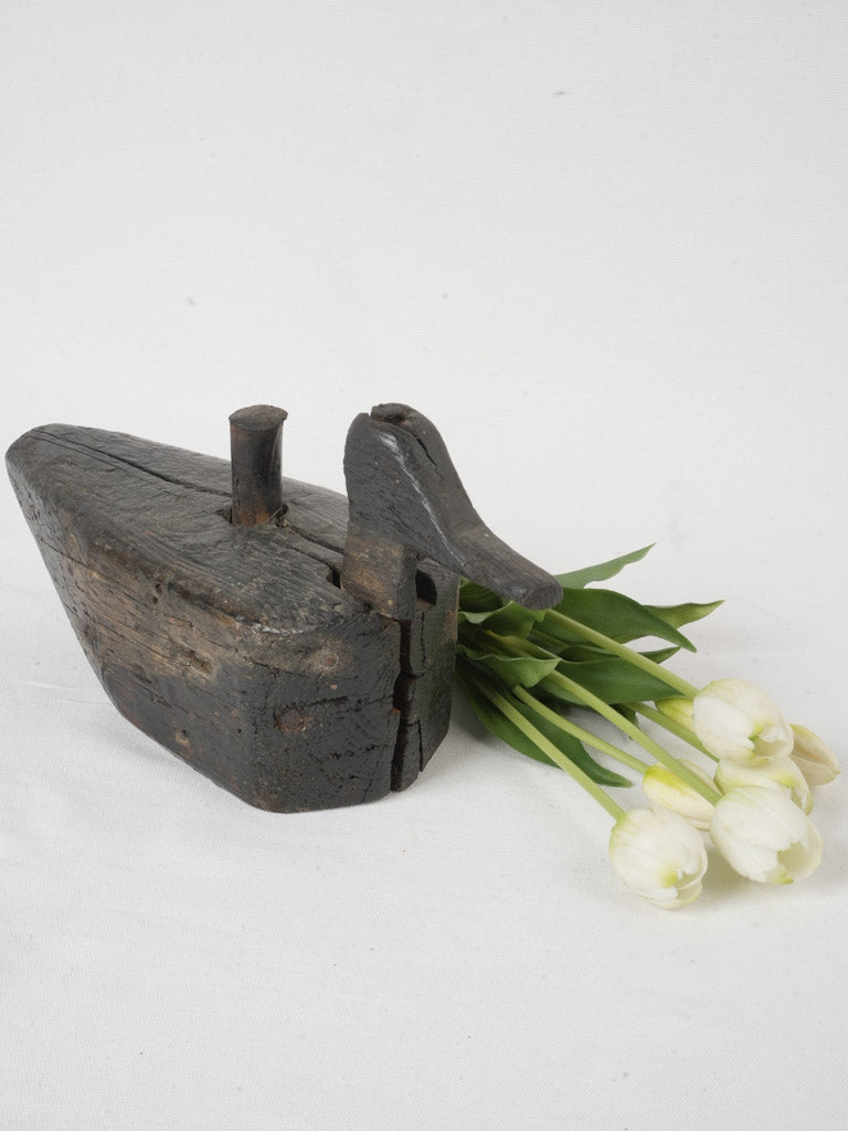 Rustic hand-carved wooden duck decoy