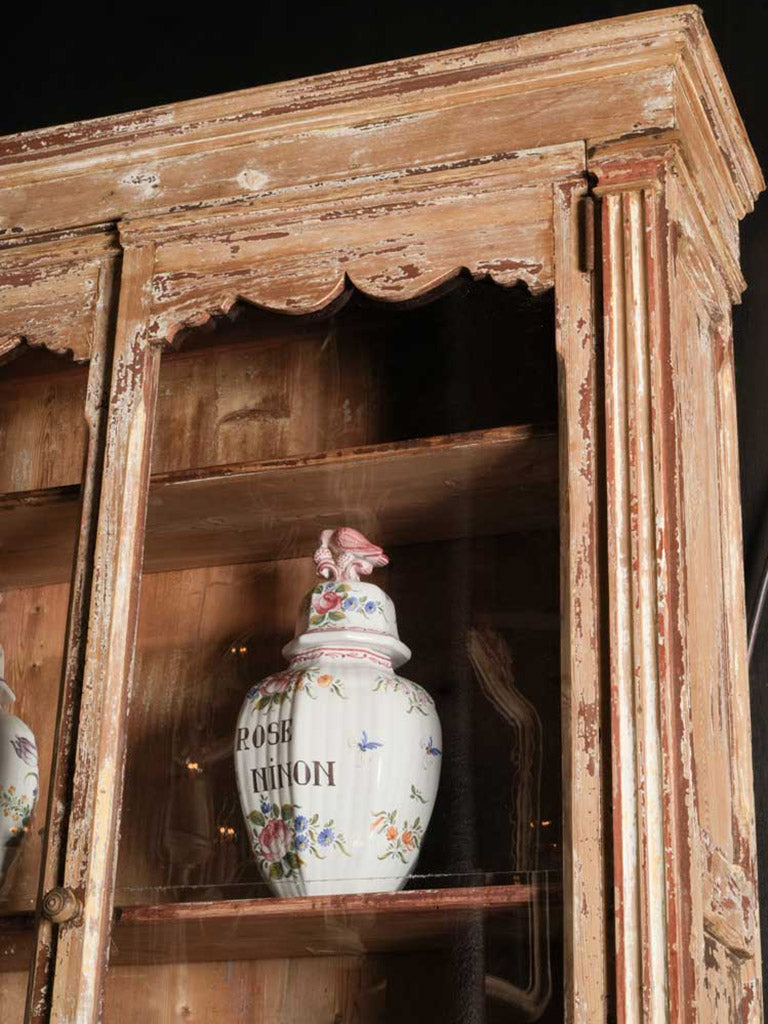 Antique pine glass-paneled cabinet