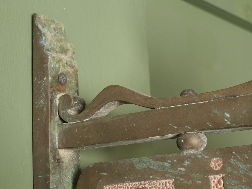 Aged brass Art Nouveau wall sign
