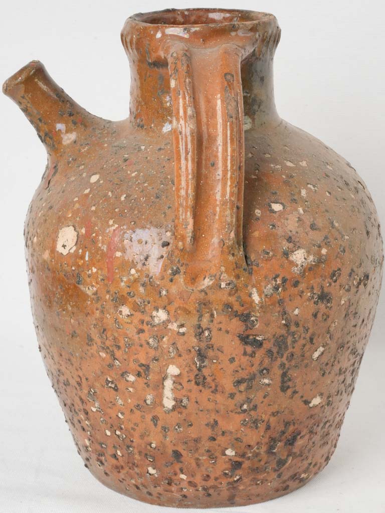 Textured, earthy tone oil jar