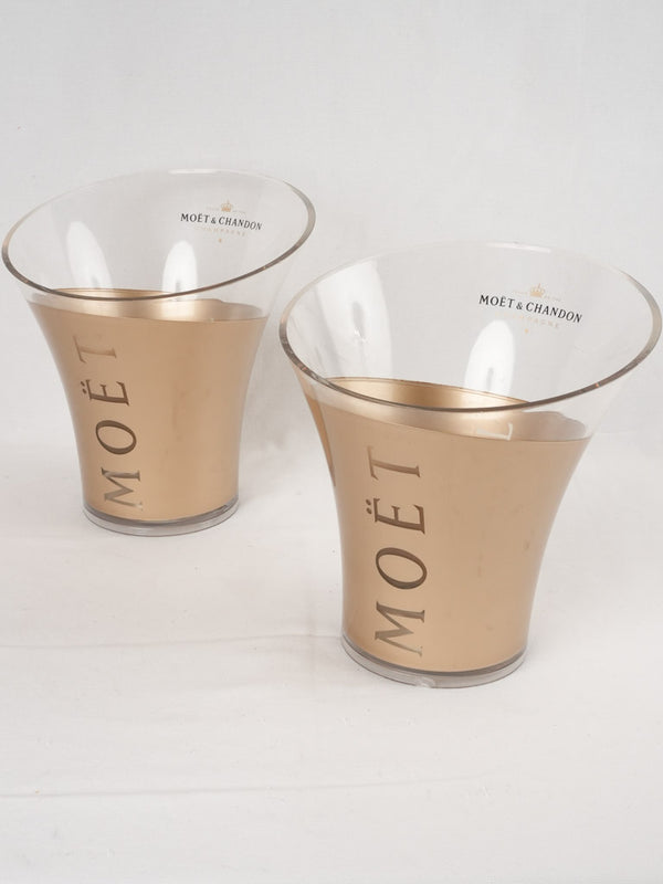 Elegant clear-plastic Champagne ice containers