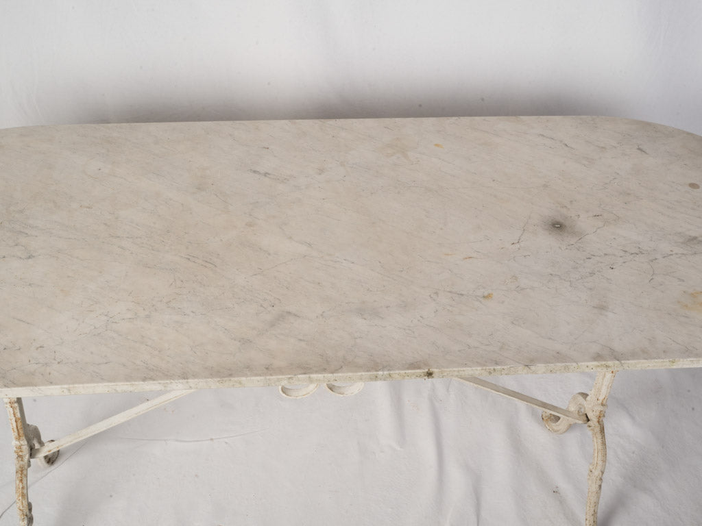 Antique-styled wrought-iron base table