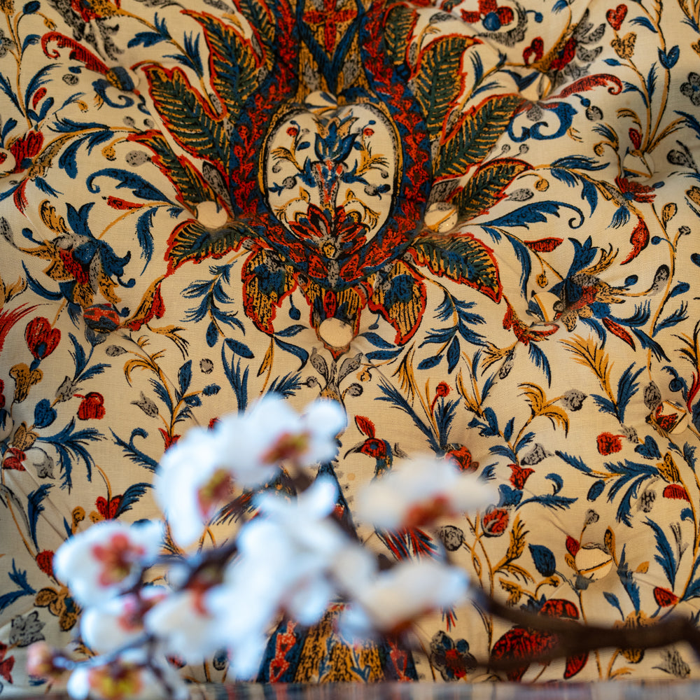 Pair of upholstered chairs w/ ruffle skirts & front wheels