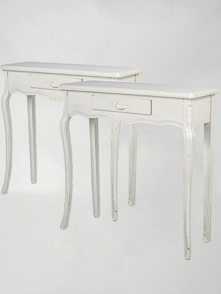 Elegant Louis XV white console pair