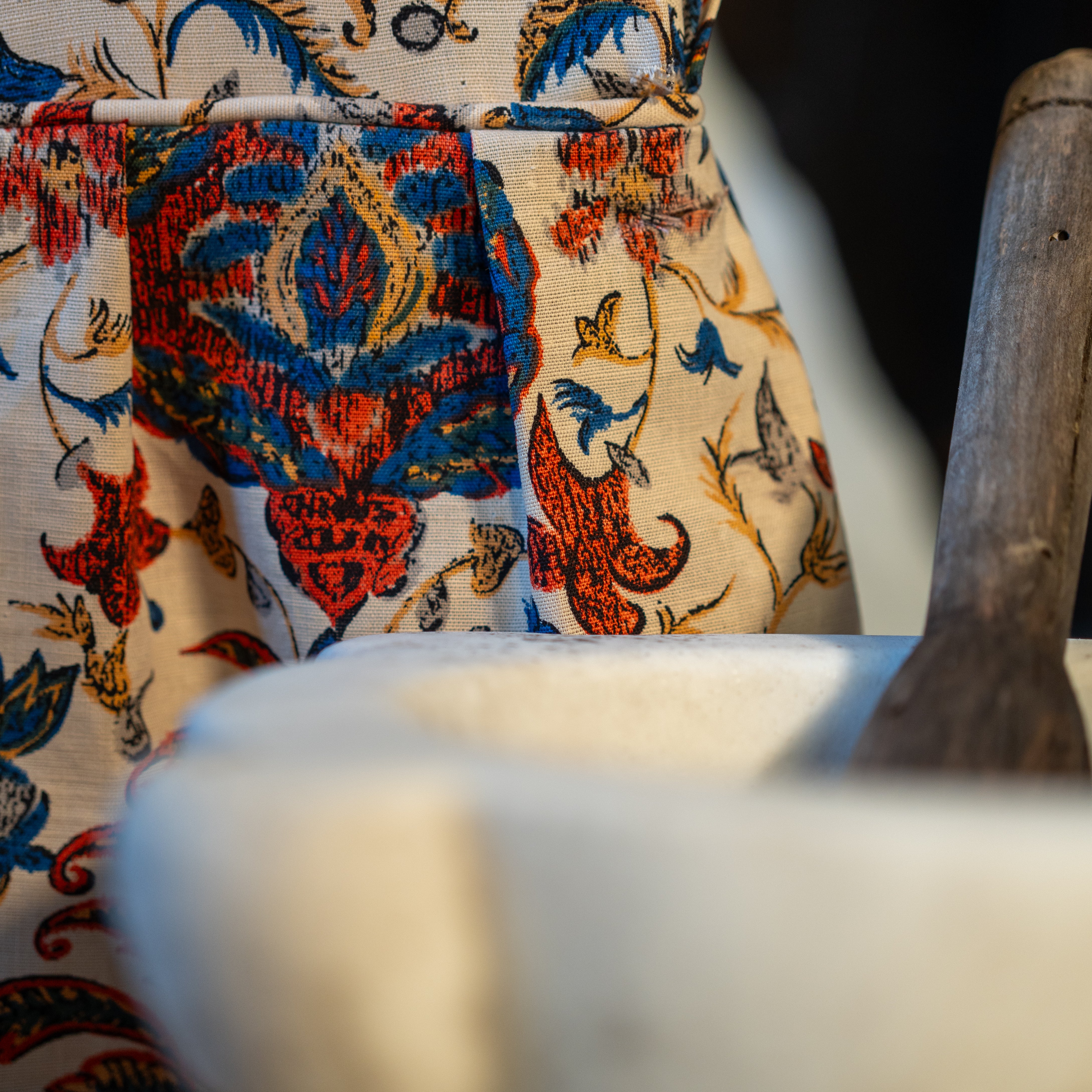 Aged white marble and wooden pestle