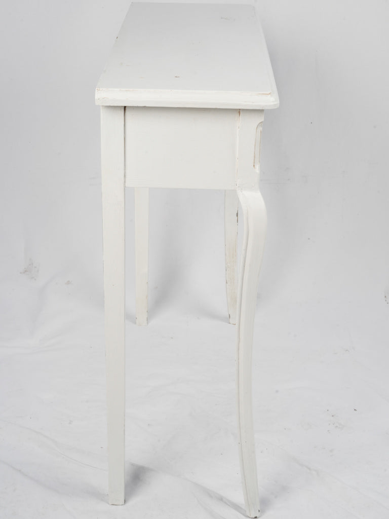 Delicate carved motif console tables