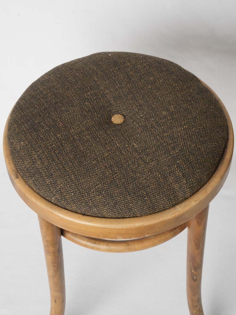 Stately round-button tweed chairs