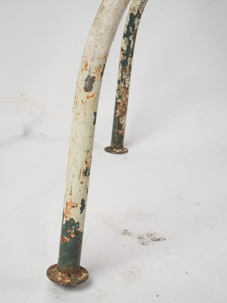 Timeworn decorative iron table