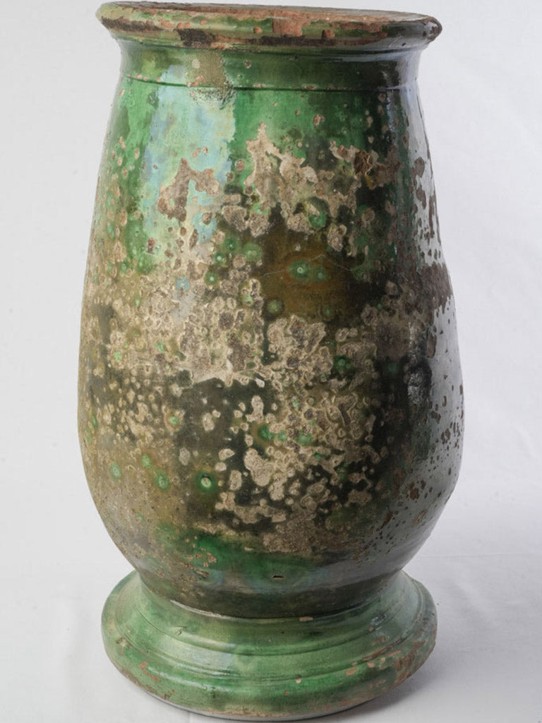 Distressed moss-covered earthenware