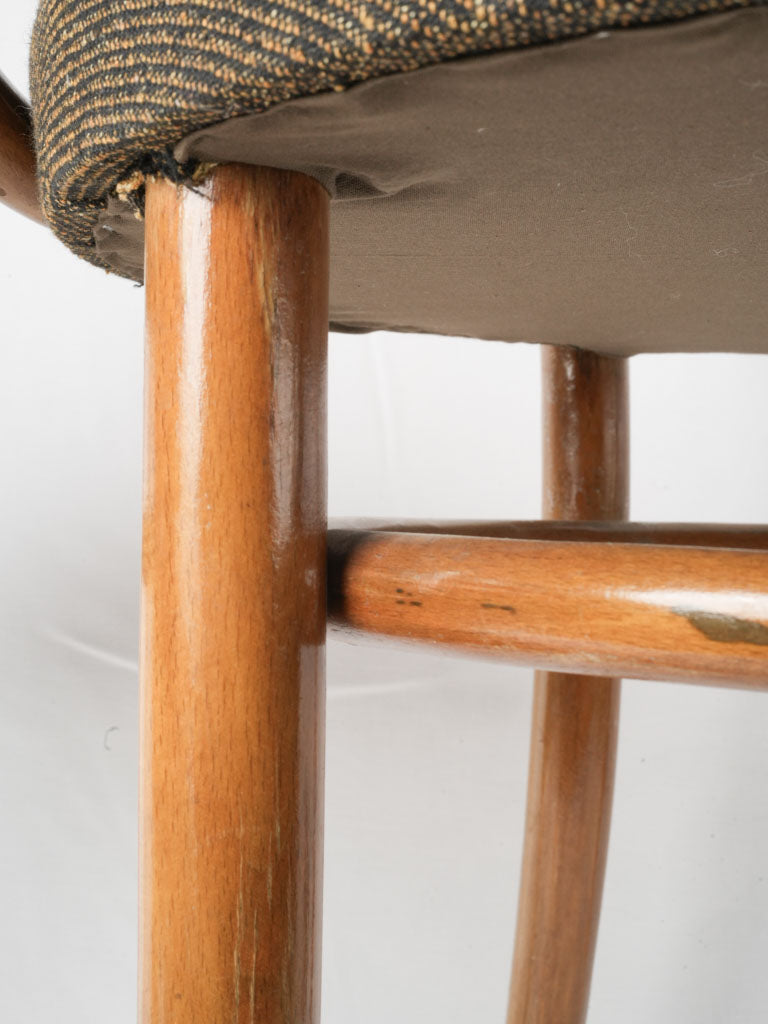 Distinctive vintage upholstered stool trio
