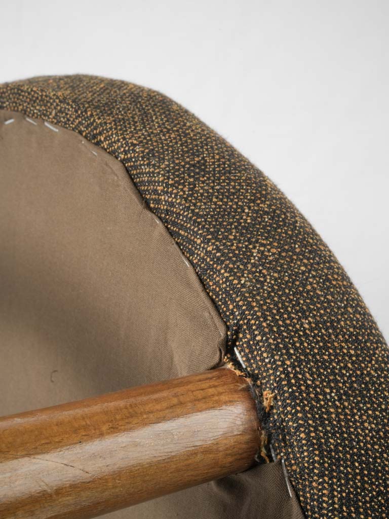 Cultured vintage armchair and stool composition