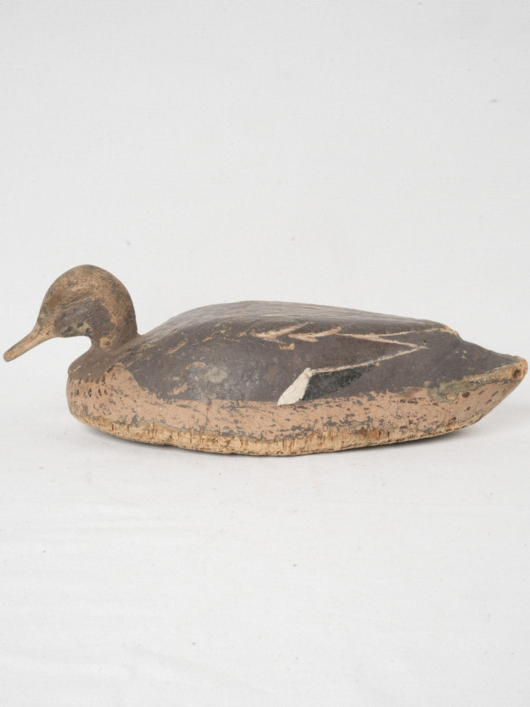 Early-century carved hunting tool