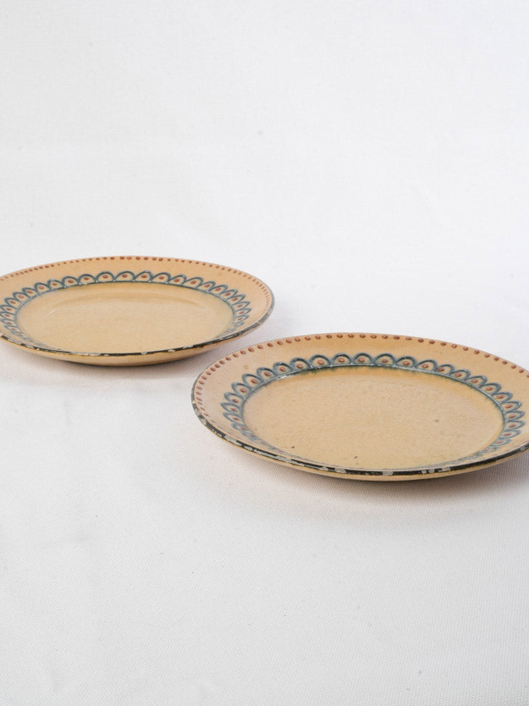 Antique hand-painted earthenware plates