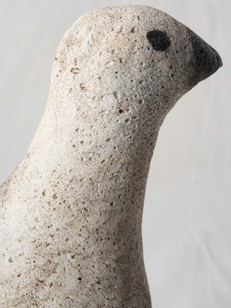Whimsical aged garden bird ornaments