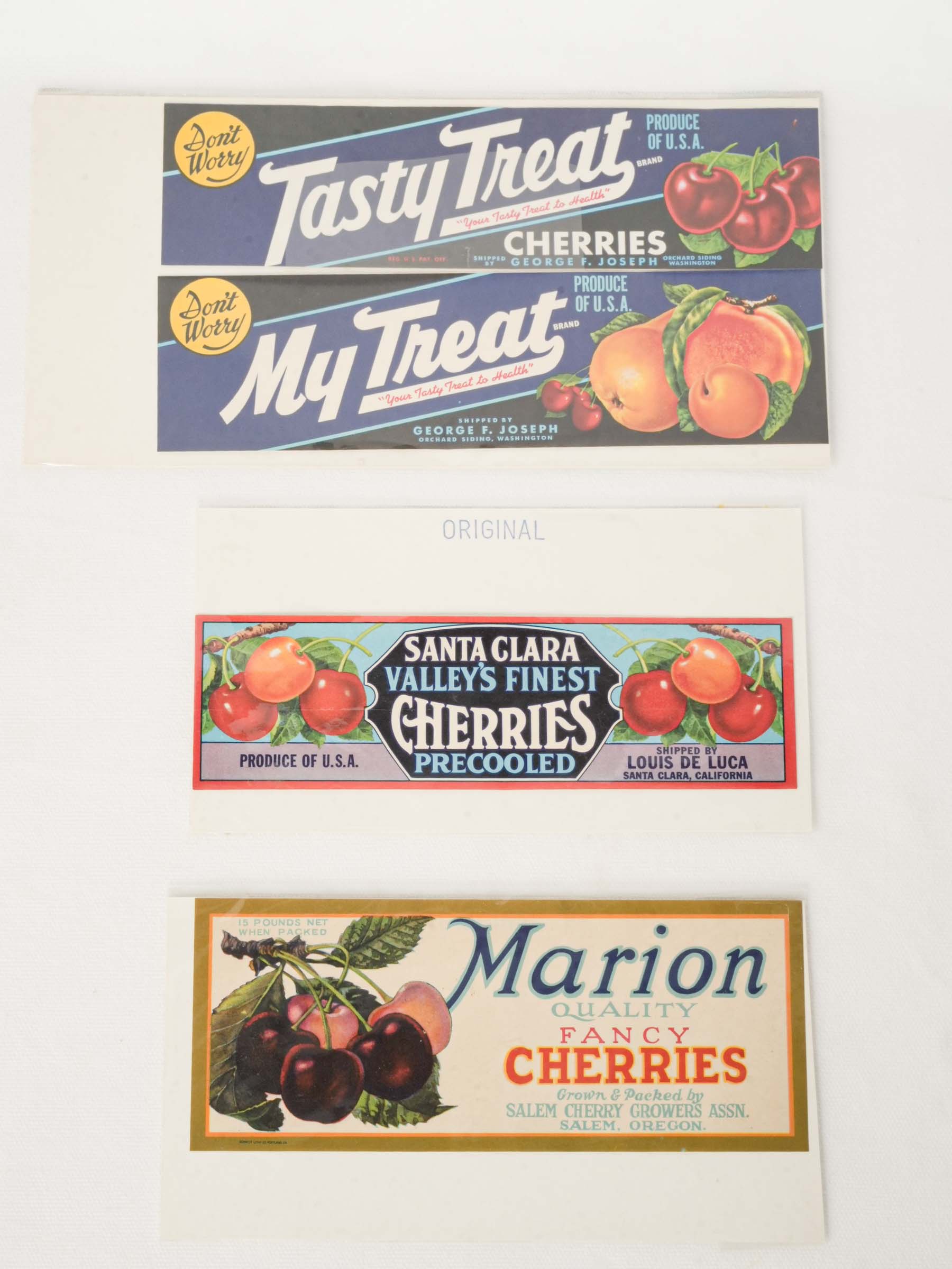 Collection of four vintage American cherry crate labels