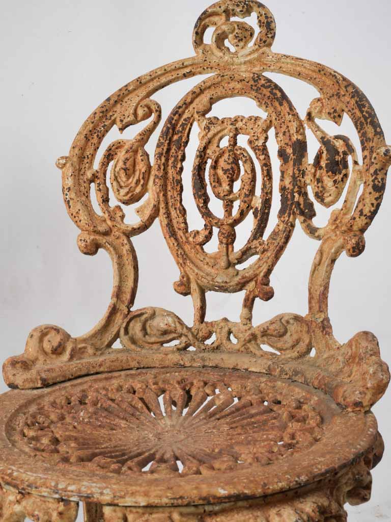 Historic rusted cast iron chairs
