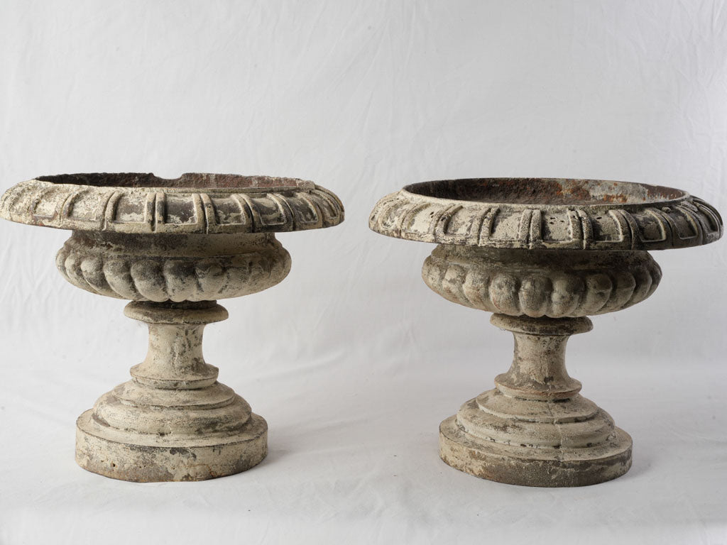 Authentic antique chipped urns