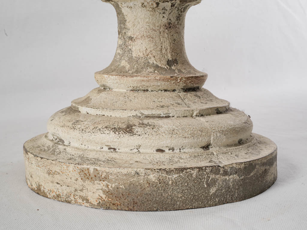Stately white patina urns
